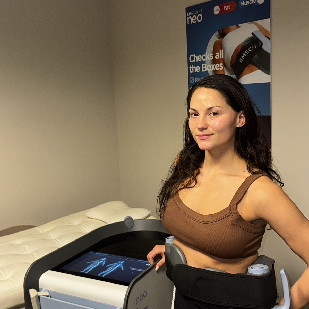 Client with the Emsculpt Neo applicator at Rescu Wellness, Scarsdale