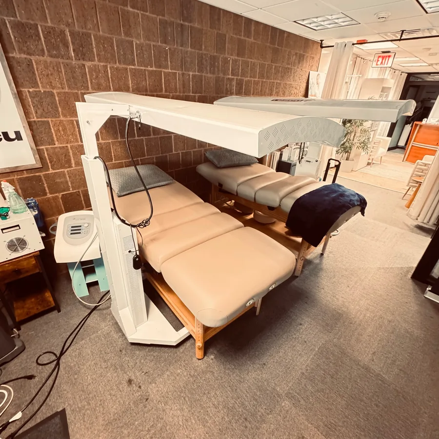 Recovery beds and an overhead light panel at Rescu